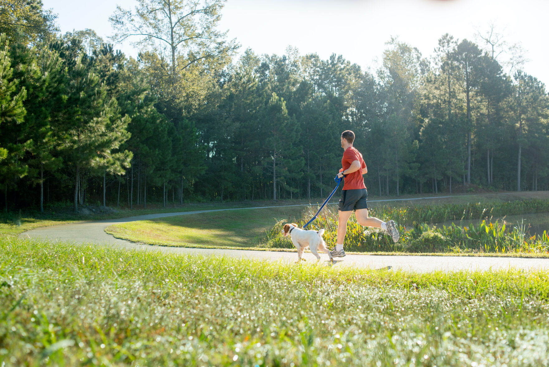 Carnes Running guy with dog